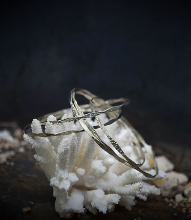 Bracelets jonc en argent massif signè Lovely Storm.