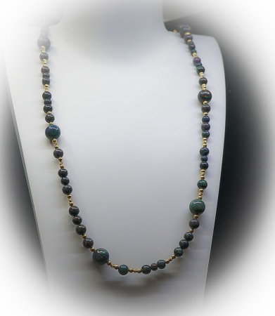 Collier Opale en Or et argent Matière: Or 750/1000 (1,95 grammes) et Argent 925/1000 (19,72 grammes) Pierre: Opales (107,4 carat