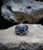 Sterling Silver and Star Sapphire Rings    Material: 925 Sterling Silver  Stone: Sapphire (1.25 carats)  Weight: 23.5 grams