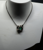 Emerald pendant in solid silver designed by Anthony Barrouyer.