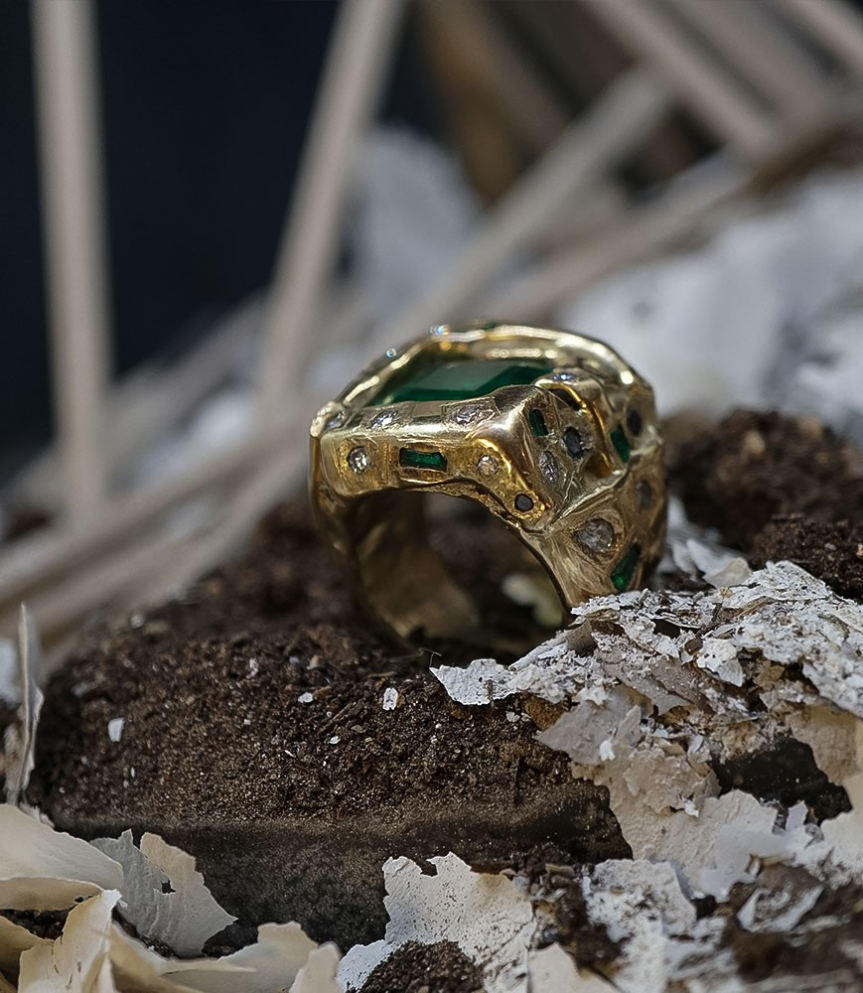 Krazystones ring: designed by Anthony Barrouyer set with emeralds, diamonds in yellow gold and white gold.