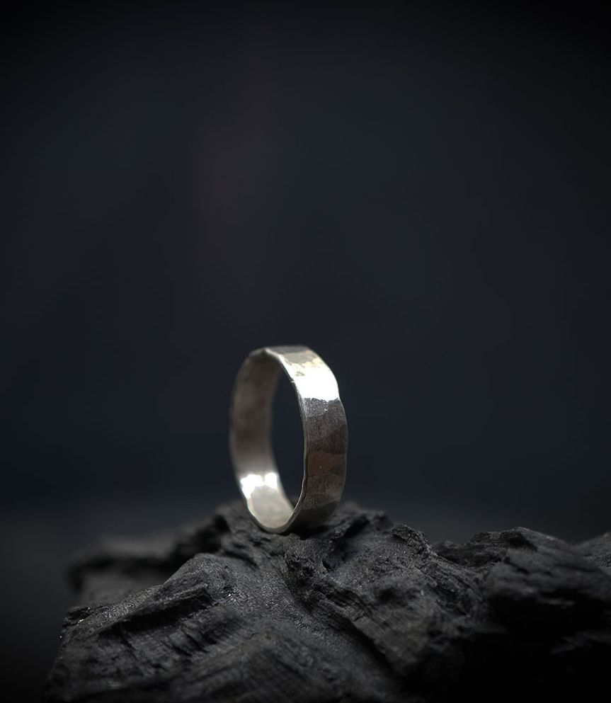 Hammered silver ring from the Anthony Barrouyer collection, signed Krazystones.