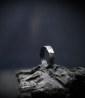 Hammered solid silver ring created by Anthony Barrouyer.
