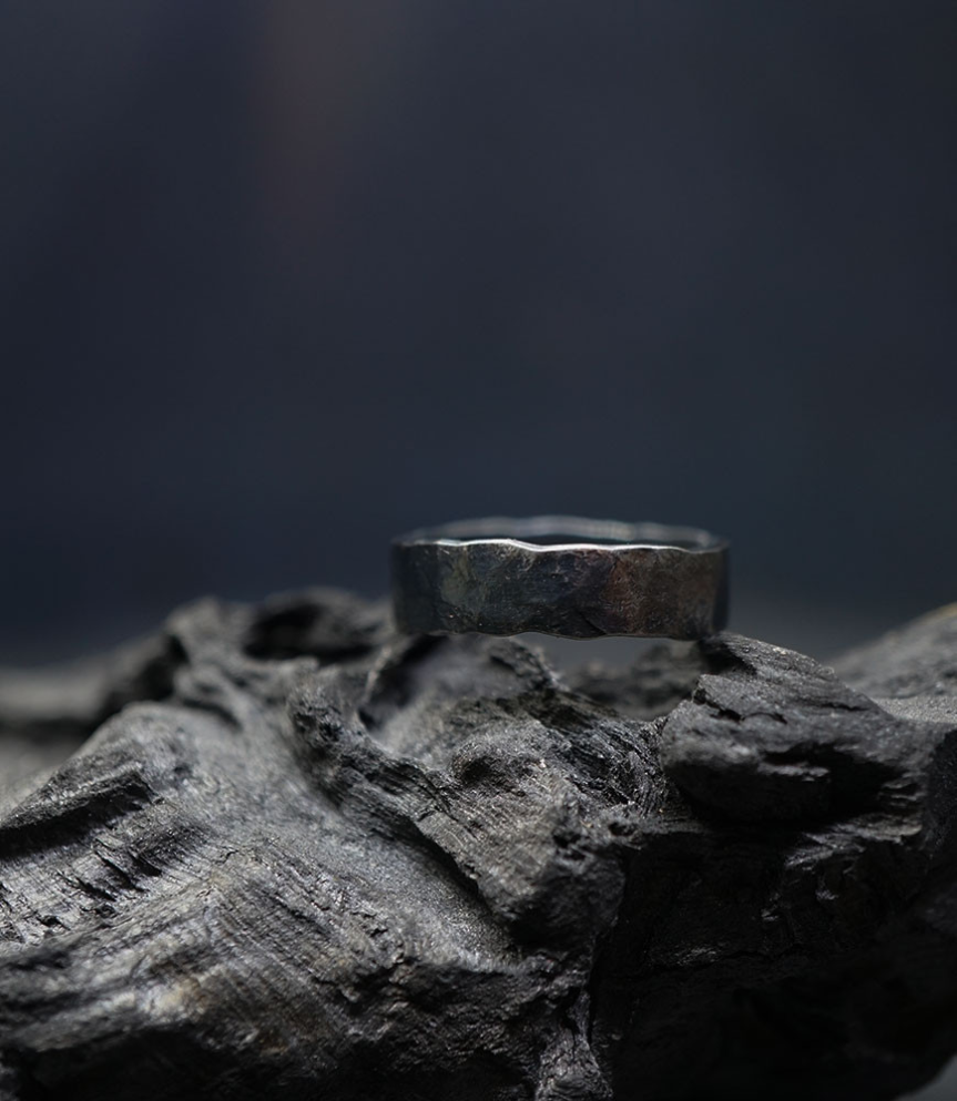 Hammered solid silver ring created by Anthony Barrouyer.