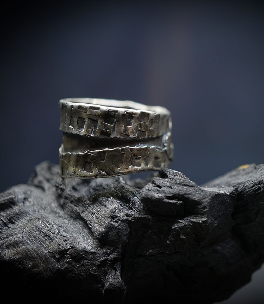 Hammered silver ring created by Anthony Barrouyer.