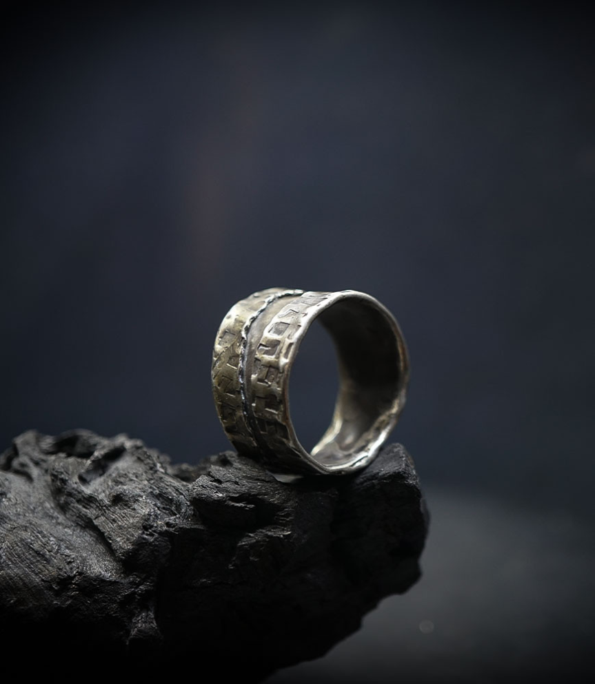 Hammered silver ring created by Anthony Barrouyer.