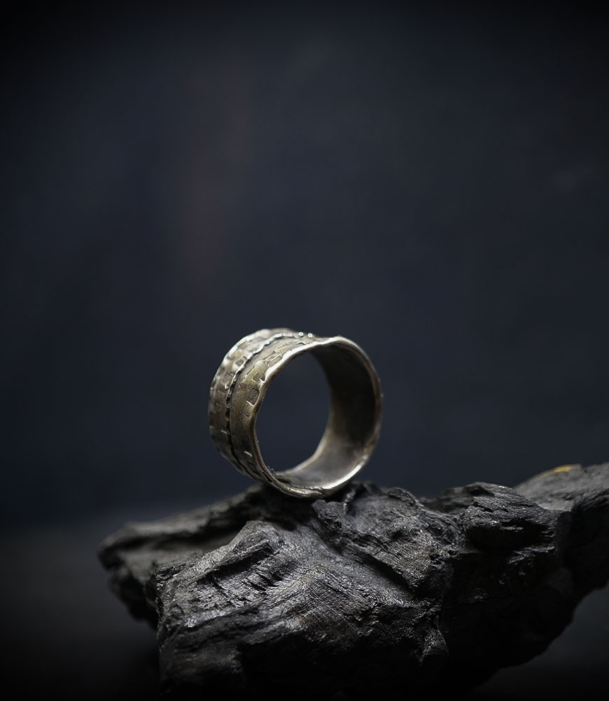 Hammered silver ring created by Anthony Barrouyer.
