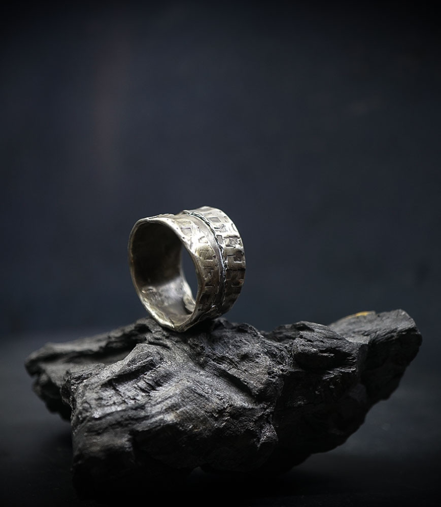 Hammered silver ring created by Anthony Barrouyer.