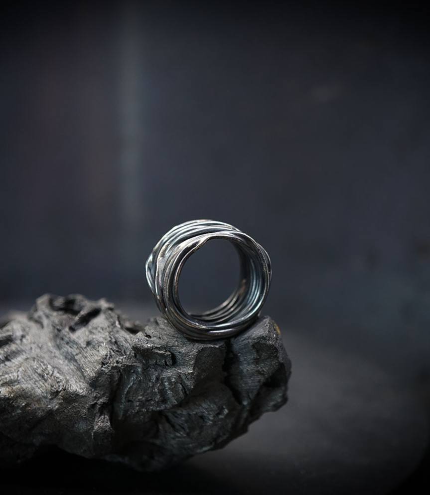 Solid silver ring created by Anthony Barrouyer.