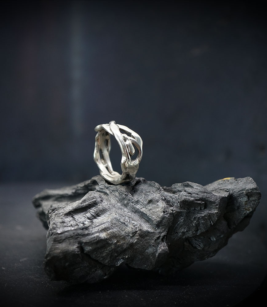 Solid silver ring.