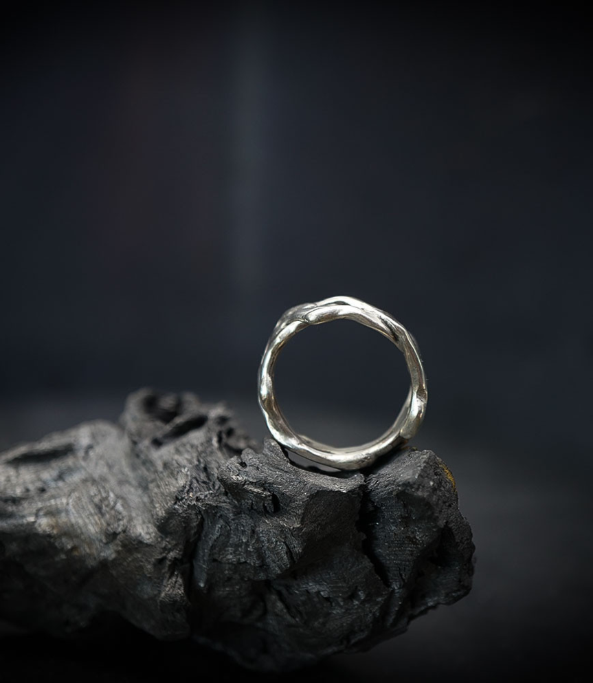 Solid silver ring.